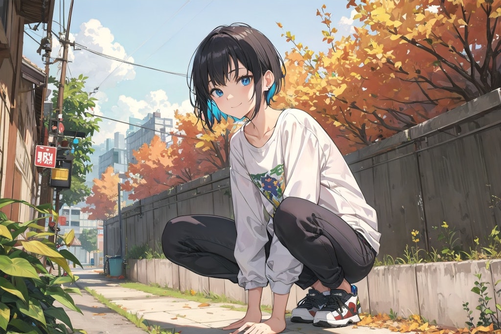 A young man sitting and resting in an alley where autumn has come