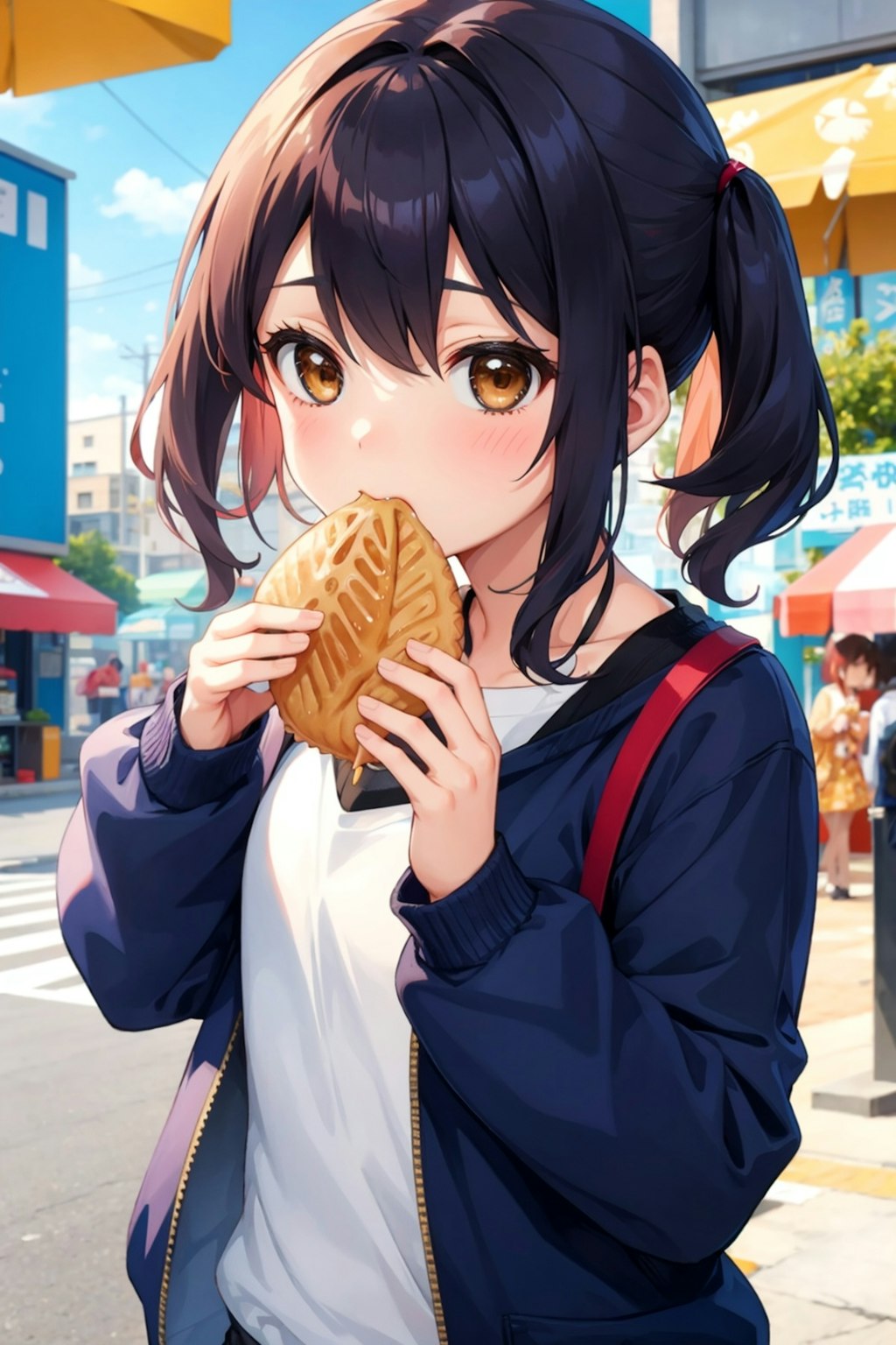 鯛焼きを頬張る女の子