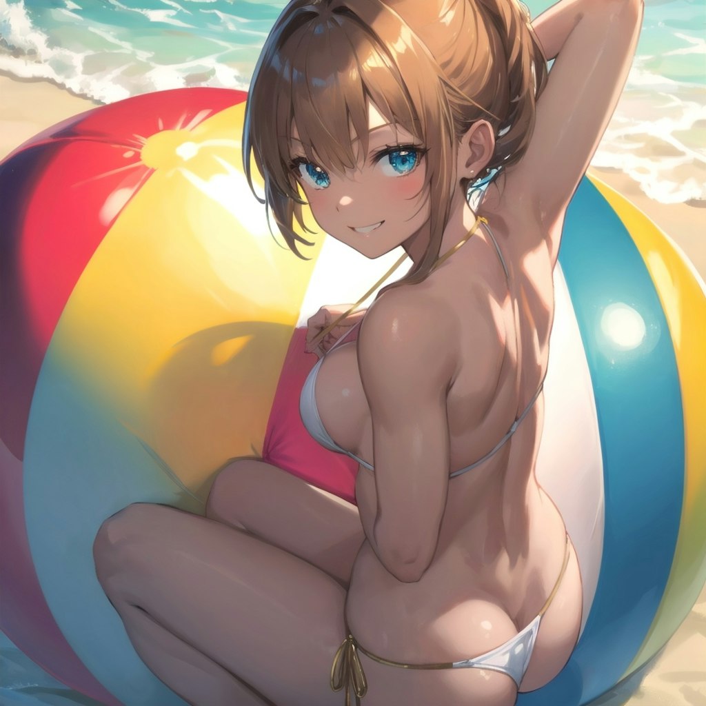 大きいビーチボールと水着の女の子