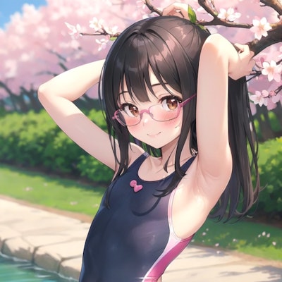 春を彩る桜の下でひと泳ぎの準備をする少女