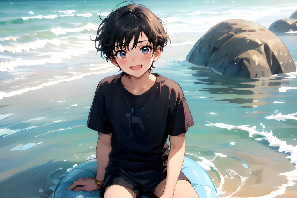 Boy sitting on the sandy beach