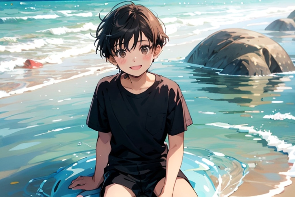 Boy sitting on the sandy beach