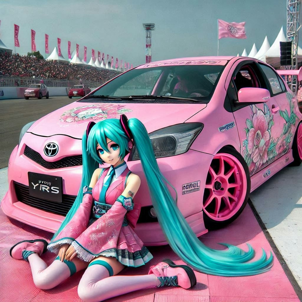 ピンクカラートヨタヤリスのドリ車と初音ミク